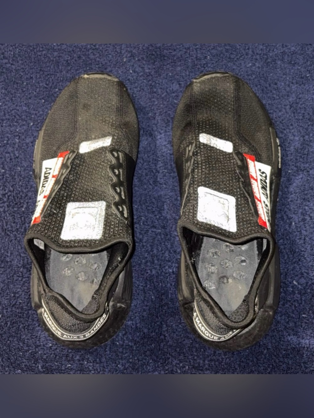 Adidas Black Slip-On Athletic Sneakers with Red and White Accents